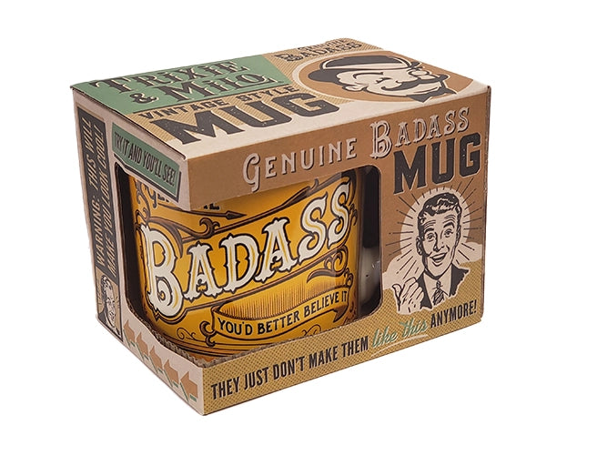 ceramic tea or coffee mug. cafe cup reads "Genuine Badass" in yellow, gold, and orange retro vintage style present in kitschy gift box